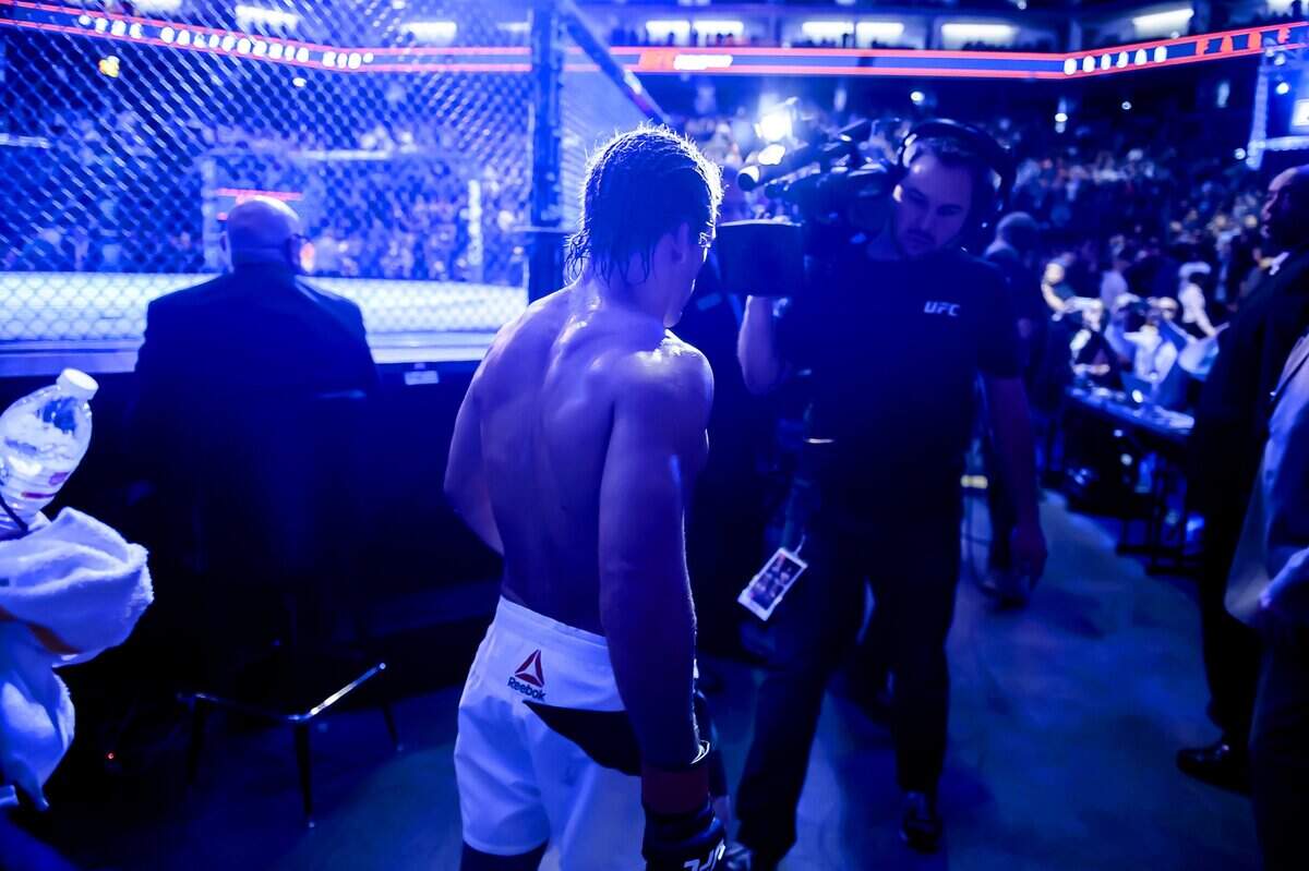 Urijah Faber of Sacramento leaves the arena after his victory over Brad Pickett from East London England in their UFC bout at Golden 1 Center on Dec. 17, 2016.